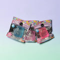 Trendzy Creations TOP TRENZ translucent bear-shaped squishy toys in blue, purple, and pink packaging