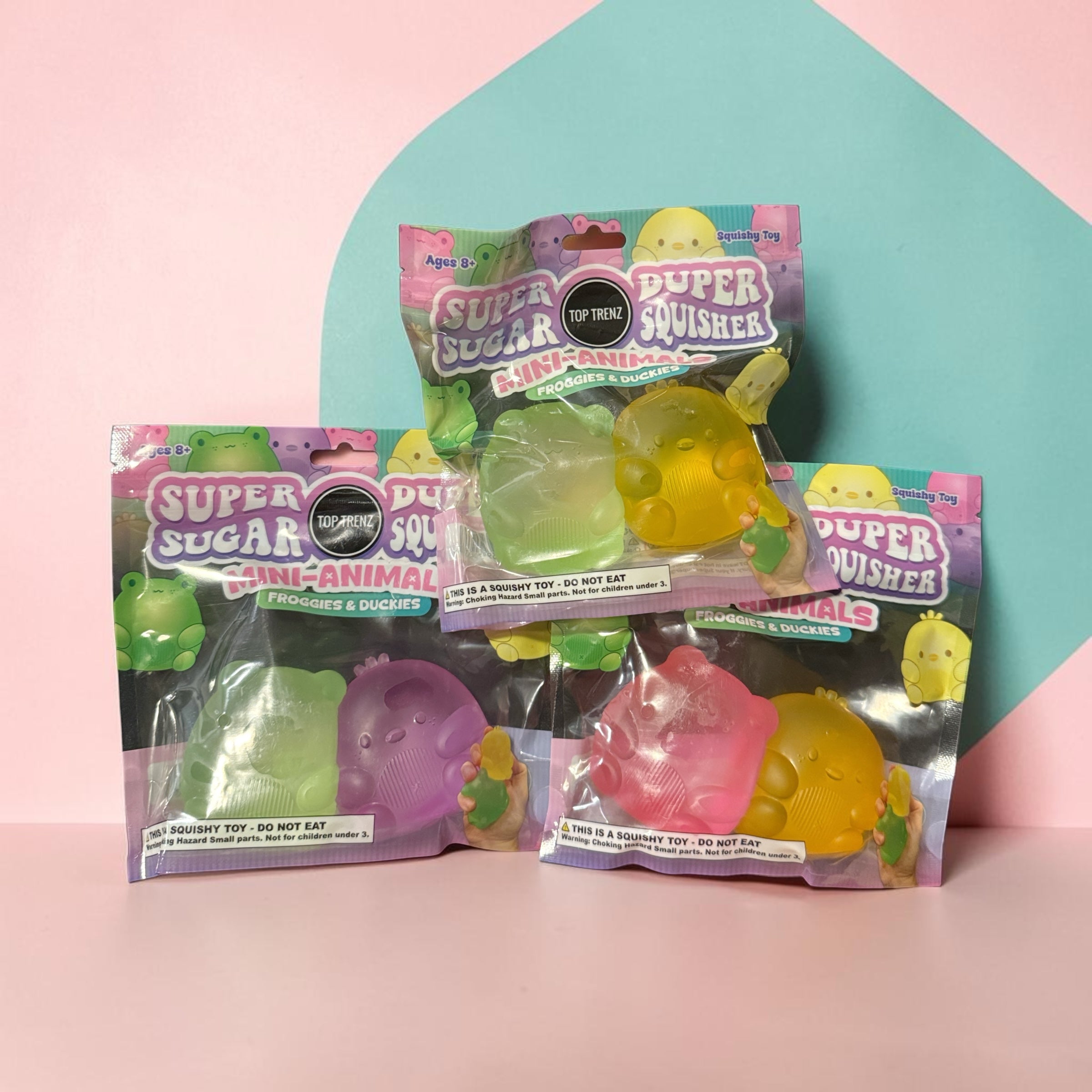Trendzy Creations TOP TRENZ Super Sugar Duper Squisher mini frog and duckling animal toys in translucent packaging