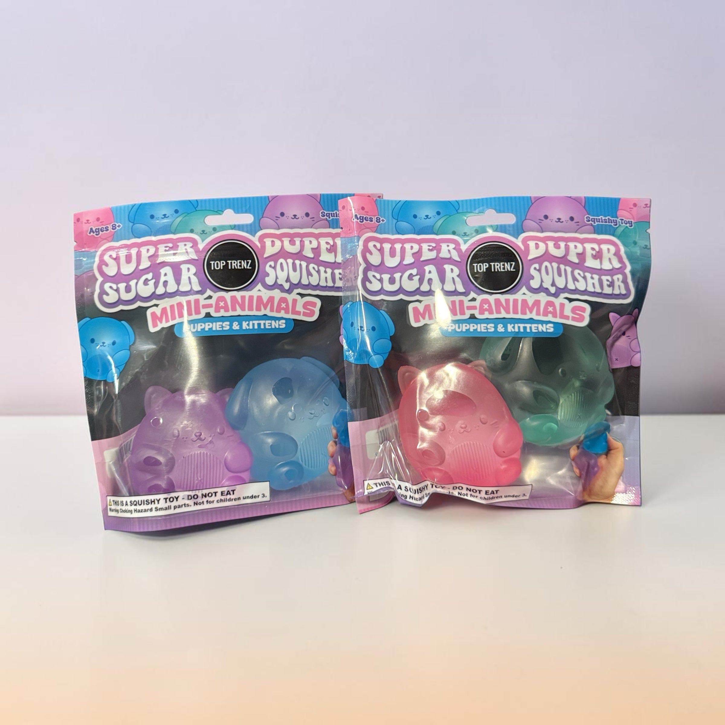 Trendzy Creations Super Sugar Duper Squisher mini animal squishy toys in translucent pink, blue, and green packaging