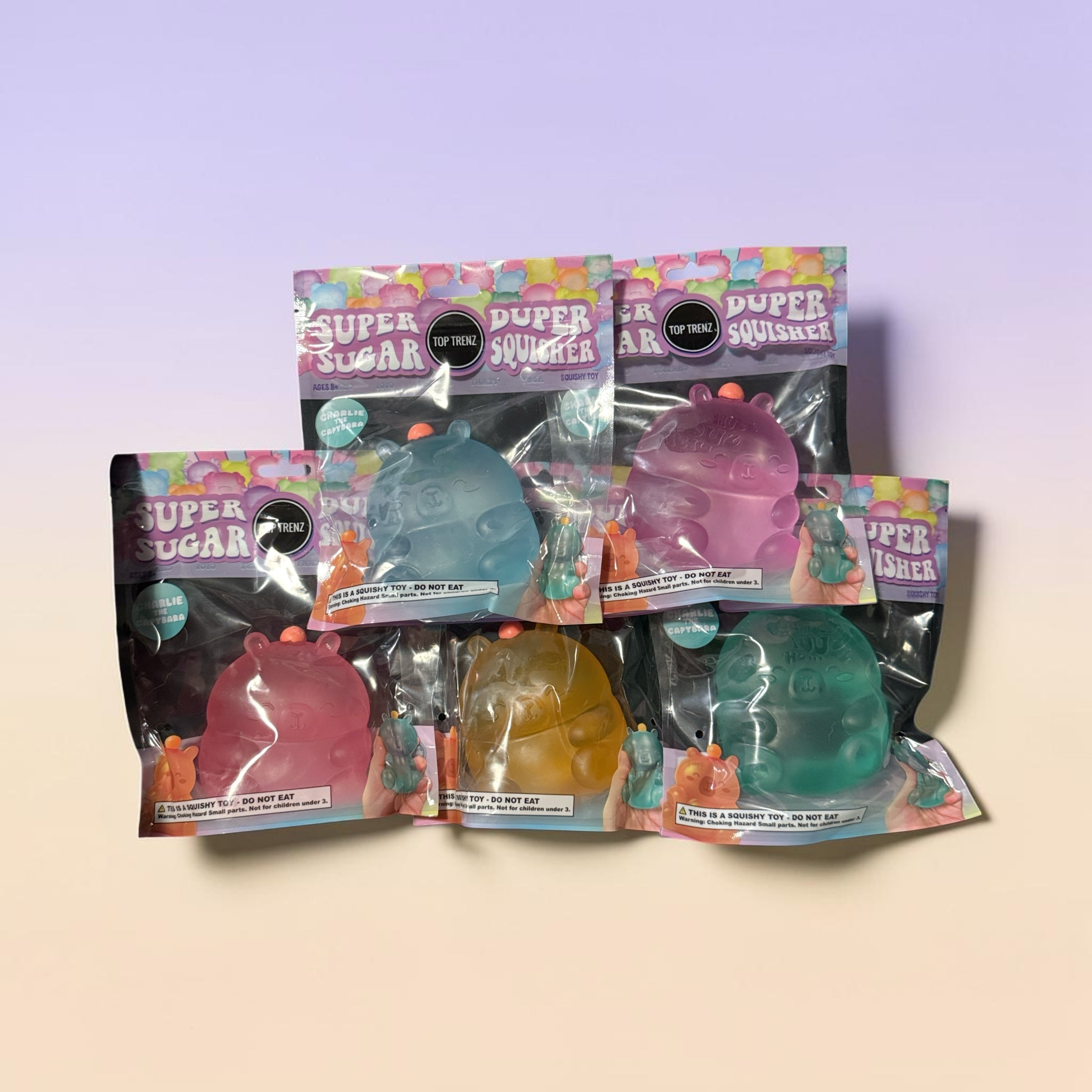 Trendzy Creations TOP TRENZ Super Sugar Duper Squisher animal toys in various translucent colors in retail packaging.